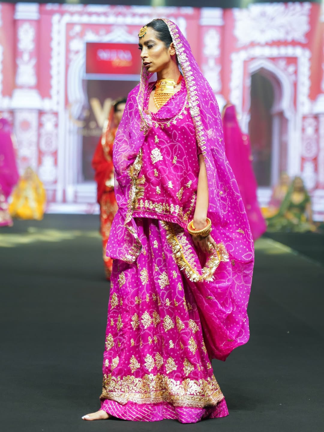 Fuchsia Bandhani Lehenga with Gold Detailing